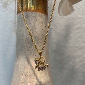 Nina Ricci Gold Heart Pendant Necklace